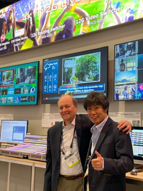 Ed Grebow meets with LWA client Satoshi Kanemura, President, FOR-A America, in the FOR-A booth at NAB 2022.